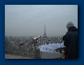 Eiffel Tower seen from the top of the Arc de Triomphe.